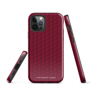 A protective iPhone case with a maroon background and a repeating pattern of small eyeglasses. Designed for the iPhone 15 Pro Max, the camera and buttons of the phone are visible. The bottom of the case features the text "Rockstar Red for iPhone" in white from Statement Cases.