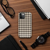 A Timeless Houndstooth for iPhone with a dual-camera system is encased in an impact-resistant polycarbonate, houndstooth-patterned case. The black and beige design features the brand name "Statement Cases" printed at the bottom, ensuring both style and dual-layer protection for your device.