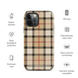 A Neutral Heritage Tartan for iPhone by Statement Cases with a plaid-patterned, impact-resistant polycarbonate case featuring beige, black, white, and red stripes. The durable phone case has the text "STATEMENT CASES" written at the bottom. The phone boasts a triple camera setup with an additional sensor and flash.