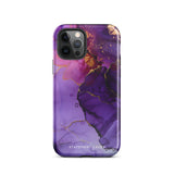 A Golden Orchid Marble smartphone case featuring a vibrant abstract design in shades of purple, accented with streaks of gold and black lines creating a marbled effect. The impact-resistant polycarbonate and TPU inner liner ensure dual-layer protection. The text "Statement Cases" is printed in white at the bottom of the case.