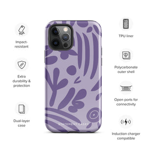 The Luna Morada for iPhone by Statement Cases is a durable phone case with a purple protective exterior featuring abstract dark purple and lavender patterns. The design includes geometric shapes and curves, giving it a modern artistic look. Made from impact-resistant polycarbonate, the lower part of the case prominently displays "STATEMENT CASES.