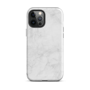 A protective iPhone case with a white marble-patterned design featuring three camera lenses and a flash. The marble pattern on this Marble Dreams for iPhone 15 Pro Max case is subtle, with light gray veining. The brand "Statement Cases" is subtly engraved at the bottom of the case.