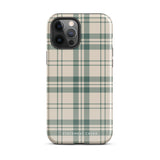 A smartphone with a beige and green plaid-patterned, impact-resistant polycarbonate case is shown. The phone’s rear camera lenses are prominently visible at the top left. The durable phone case features the words “Statement Cases” printed in small text at the bottom center. This is the Elegant Plaid for iPhone.