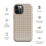 A smartphone with a brown and beige houndstooth-patterned case is shown from the back. The impact-resistant, dual-layered Classic Houndstooth for iPhone by Statement Cases protects the phone's body and leaves openings for the camera lenses and flash. The hues give the case a stylish and sophisticated appearance.