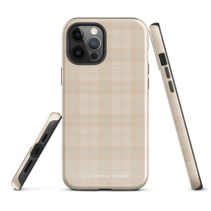 A smartphone with a plaid design case is displayed. The durable phone case features a beige and light brown checked pattern. The phone's camera lenses are visible at the top left corner. With dual-layer protection, the bottom of the impact-resistant polycarbonate Sophisticated Plaid for iPhone case reads "Statement Cases" in white.