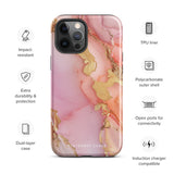 The Gold Blush Marble for iPhone showcases a glossy, marble-patterned case in shades of pink and gold. The decorative design features swirling patterns, seamlessly blending the colors. Crafted with impact-resistant polycarbonate for superior phone protection, "Statement Cases" is written in white at the bottom.