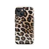 A smartphone with a Mighty Jaguar Fur for iPhone protective case by Statement Cases. The design features a classic leopard fur pattern with black spots on a tan and brown background. The camera lenses of the iPhone 15 Pro Max are clearly visible at the top left corner of the phone. The word "Statement." is partially visible at the bottom.