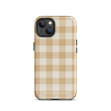 A Gingham Grace for iPhone by Statement Cases is covered with a protective case featuring a beige and white checkered pattern. The case's design includes a matte finish, dual-layer protection with an impact-resistant polycarbonate exterior and TPU lining, and the text "Statement Cases" printed near the bottom. The phone's cameras and buttons are visible.