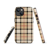 A Neutral Heritage Tartan for iPhone by Statement Cases with a plaid-patterned, impact-resistant polycarbonate case featuring beige, black, white, and red stripes. The durable phone case has the text "STATEMENT CASES" written at the bottom. The phone boasts a triple camera setup with an additional sensor and flash.