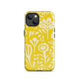 The Sol Dorado for iPhone by Statement Cases is a smartphone with a yellow case featuring a white, abstract floral and plant pattern. The camera lenses are prominent in the top left corner of the device. With dual-layer protection and impact-resistant TPU lining, "Statement Cases" is printed at the bottom of the case.