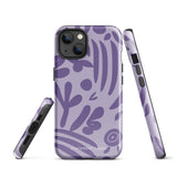 The Luna Morada for iPhone by Statement Cases is a durable phone case with a purple protective exterior featuring abstract dark purple and lavender patterns. The design includes geometric shapes and curves, giving it a modern artistic look. Made from impact-resistant polycarbonate, the lower part of the case prominently displays "STATEMENT CASES.