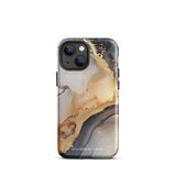 A smartphone with a sleek, marbled design case featuring swirls of gold, beige, and dark grey colors. The camera lenses on the back of the iPhone 15 Pro Max are clearly visible, and the protective Lunar & Gold Marble for iPhone case is branded with "Statement Cases" at the bottom.