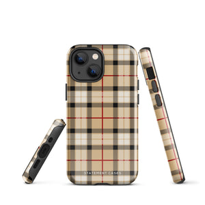 A Neutral Heritage Tartan for iPhone by Statement Cases with a plaid-patterned, impact-resistant polycarbonate case featuring beige, black, white, and red stripes. The durable phone case has the text "STATEMENT CASES" written at the bottom. The phone boasts a triple camera setup with an additional sensor and flash.