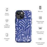 An iPhone encased in the "Mariposa Azul" by Statement Cases, featuring a blue design with an abstract white leaf pattern. The case combines curved and pointed shapes and provides dual-layer protection with TPU lining and impact-resistant polycarbonate. Camera lenses and other top elements remain unobstructed, and "Statement Cases" is inscribed at the bottom.