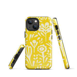 The Sol Dorado for iPhone by Statement Cases is a smartphone with a yellow case featuring a white, abstract floral and plant pattern. The camera lenses are prominent in the top left corner of the device. With dual-layer protection and impact-resistant TPU lining, "Statement Cases" is printed at the bottom of the case.