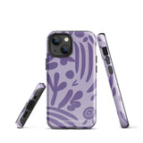 The Luna Morada for iPhone by Statement Cases is a durable phone case with a purple protective exterior featuring abstract dark purple and lavender patterns. The design includes geometric shapes and curves, giving it a modern artistic look. Made from impact-resistant polycarbonate, the lower part of the case prominently displays "STATEMENT CASES.