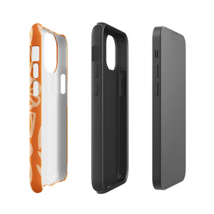 A Savannah Ardiente for iPhone from Statement Cases, featuring a dual-layered phone case in orange with a floral pattern showcasing cream-colored flowers, leaves, and geometric shapes. This impact-resistant polycarbonate case displays "STATEMENT CASES" at the bottom and reveals the camera lenses at the top left corner.