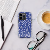 An iPhone encased in the "Mariposa Azul" by Statement Cases, featuring a blue design with an abstract white leaf pattern. The case combines curved and pointed shapes and provides dual-layer protection with TPU lining and impact-resistant polycarbonate. Camera lenses and other top elements remain unobstructed, and "Statement Cases" is inscribed at the bottom.