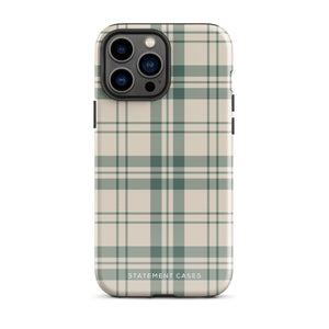 A smartphone with a beige and green plaid-patterned, impact-resistant polycarbonate case is shown. The phone’s rear camera lenses are prominently visible at the top left. The durable phone case features the words “Statement Cases” printed in small text at the bottom center. This is the Elegant Plaid for iPhone.