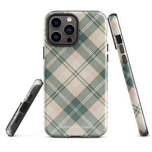 An Aristocrats Plaid for iPhone with a plaid-patterned case in shades of green, beige, and off-white. The camera lenses are positioned at the top left corner, and the dual-layer protection extends over the edges providing full coverage. The brand "Statement Cases" is subtly visible at the bottom.