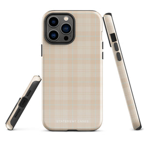 A smartphone with a plaid design case is displayed. The durable phone case features a beige and light brown checked pattern. The phone's camera lenses are visible at the top left corner. With dual-layer protection, the bottom of the impact-resistant polycarbonate Sophisticated Plaid for iPhone case reads "Statement Cases" in white.