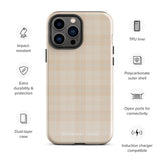 A smartphone with a plaid design case is displayed. The durable phone case features a beige and light brown checked pattern. The phone's camera lenses are visible at the top left corner. With dual-layer protection, the bottom of the impact-resistant polycarbonate Sophisticated Plaid for iPhone case reads "Statement Cases" in white.