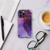 A Statement Cases Golden Orchid Marble for iPhone with a case featuring an abstract design of swirling purple, pink, and gold hues over a white background. The marbled patterns with metallic accents provide dual-layer protection and are impact-resistant. The top of the case has cutouts for the phone's camera lenses and is induction charging compatible.