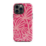 Introducing the Zafiro Rosa for iPhone by Statement Cases: a smartphone case featuring abstract floral and leaf patterns in various shades of pink. This dual-layer protection case combines an impact-resistant polycarbonate exterior with a TPU inner liner to ensure durability. The design showcases the brand name "Statement Cases" at the bottom, with precise cutouts revealing the phone’s camera lenses at the top left corner.