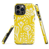 The Sol Dorado for iPhone by Statement Cases is a smartphone with a yellow case featuring a white, abstract floral and plant pattern. The camera lenses are prominent in the top left corner of the device. With dual-layer protection and impact-resistant TPU lining, "Statement Cases" is printed at the bottom of the case.