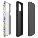 The Lisboa Azul for iPhone by Statement Cases is a smartphone adorned with a dual-layer protection phone case, featuring an intricate blue and white tile pattern. The design showcases various geometric and floral motifs, forming a visually appealing mosaic effect. The impact-resistant camera lenses and flash are prominently visible at the top left.