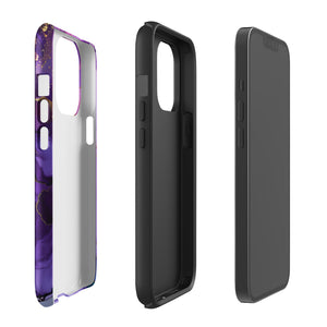 A Statement Cases Golden Orchid Marble for iPhone with a case featuring an abstract design of swirling purple, pink, and gold hues over a white background. The marbled patterns with metallic accents provide dual-layer protection and are impact-resistant. The top of the case has cutouts for the phone's camera lenses and is induction charging compatible.