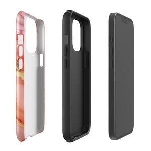 The Gold Blush Marble for iPhone showcases a glossy, marble-patterned case in shades of pink and gold. The decorative design features swirling patterns, seamlessly blending the colors. Crafted with impact-resistant polycarbonate for superior phone protection, "Statement Cases" is written in white at the bottom.