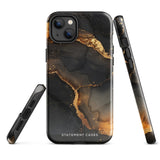 A protective iPhone case with a black and gold abstract marble design. "Statement Cases" is printed in white at the bottom. The camera module of the iPhone 15 Pro Max is visible, highlighting the triple lens setup. This is the Midnight Volcano Marble for iPhone by Statement Cases.