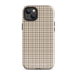 A smartphone with a brown and beige houndstooth-patterned case is shown from the back. The impact-resistant, dual-layered Classic Houndstooth for iPhone by Statement Cases protects the phone's body and leaves openings for the camera lenses and flash. The hues give the case a stylish and sophisticated appearance.