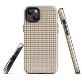 A smartphone with a brown and beige houndstooth-patterned case is shown from the back. The impact-resistant, dual-layered Classic Houndstooth for iPhone by Statement Cases protects the phone's body and leaves openings for the camera lenses and flash. The hues give the case a stylish and sophisticated appearance.