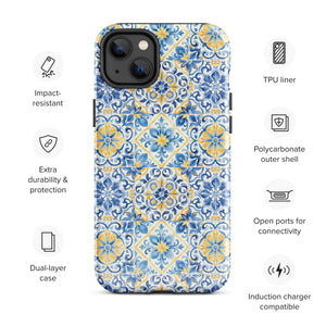 The Blue Mirage for iPhone by Statement Cases features a dual-layered, impact-resistant polycarbonate exterior with a TPU inner liner. Inspired by traditional Portuguese tiles, the blue and yellow patterned case boasts an intricate design of floral and geometric motifs. With its elegant and colorful appearance, the phone's camera is visible at the top left of the case.