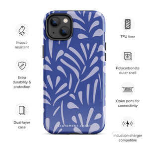 An iPhone encased in the "Mariposa Azul" by Statement Cases, featuring a blue design with an abstract white leaf pattern. The case combines curved and pointed shapes and provides dual-layer protection with TPU lining and impact-resistant polycarbonate. Camera lenses and other top elements remain unobstructed, and "Statement Cases" is inscribed at the bottom.