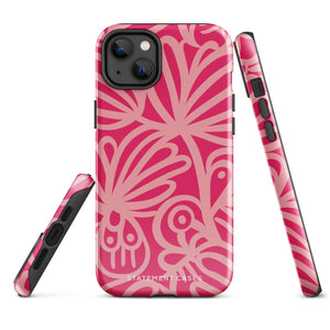 Introducing the Zafiro Rosa for iPhone by Statement Cases: a smartphone case featuring abstract floral and leaf patterns in various shades of pink. This dual-layer protection case combines an impact-resistant polycarbonate exterior with a TPU inner liner to ensure durability. The design showcases the brand name "Statement Cases" at the bottom, with precise cutouts revealing the phone’s camera lenses at the top left corner.