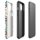 Statement Cases' Mediterranean Bloom for iPhone is showcased, featuring an intricate, colorful pattern. The design includes blue, yellow, and orange floral shapes in a symmetrical arrangement on a light blue background. This durable phone case provides dual-layer protection and is constructed from impact-resistant polycarbonate to safeguard your device.