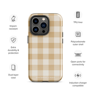 A Gingham Grace for iPhone by Statement Cases is covered with a protective case featuring a beige and white checkered pattern. The case's design includes a matte finish, dual-layer protection with an impact-resistant polycarbonate exterior and TPU lining, and the text "Statement Cases" printed near the bottom. The phone's cameras and buttons are visible.