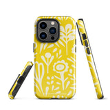 The Sol Dorado for iPhone by Statement Cases is a smartphone with a yellow case featuring a white, abstract floral and plant pattern. The camera lenses are prominent in the top left corner of the device. With dual-layer protection and impact-resistant TPU lining, "Statement Cases" is printed at the bottom of the case.