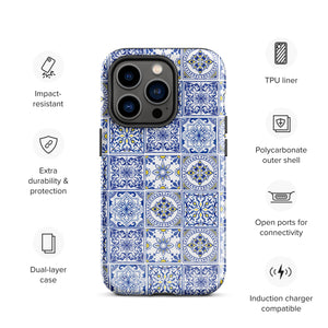 The Lisboa Azul for iPhone by Statement Cases is a smartphone adorned with a dual-layer protection phone case, featuring an intricate blue and white tile pattern. The design showcases various geometric and floral motifs, forming a visually appealing mosaic effect. The impact-resistant camera lenses and flash are prominently visible at the top left.