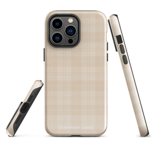 A smartphone with a plaid design case is displayed. The durable phone case features a beige and light brown checked pattern. The phone's camera lenses are visible at the top left corner. With dual-layer protection, the bottom of the impact-resistant polycarbonate Sophisticated Plaid for iPhone case reads "Statement Cases" in white.