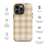 A Gingham Grace for iPhone by Statement Cases is covered with a protective case featuring a beige and white checkered pattern. The case's design includes a matte finish, dual-layer protection with an impact-resistant polycarbonate exterior and TPU lining, and the text "Statement Cases" printed near the bottom. The phone's cameras and buttons are visible.