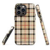 A Neutral Heritage Tartan for iPhone by Statement Cases with a plaid-patterned, impact-resistant polycarbonate case featuring beige, black, white, and red stripes. The durable phone case has the text "STATEMENT CASES" written at the bottom. The phone boasts a triple camera setup with an additional sensor and flash.