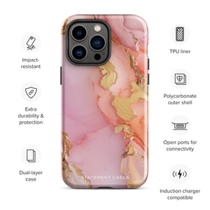 The Gold Blush Marble for iPhone showcases a glossy, marble-patterned case in shades of pink and gold. The decorative design features swirling patterns, seamlessly blending the colors. Crafted with impact-resistant polycarbonate for superior phone protection, "Statement Cases" is written in white at the bottom.