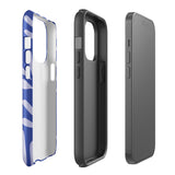 An iPhone encased in the "Mariposa Azul" by Statement Cases, featuring a blue design with an abstract white leaf pattern. The case combines curved and pointed shapes and provides dual-layer protection with TPU lining and impact-resistant polycarbonate. Camera lenses and other top elements remain unobstructed, and "Statement Cases" is inscribed at the bottom.