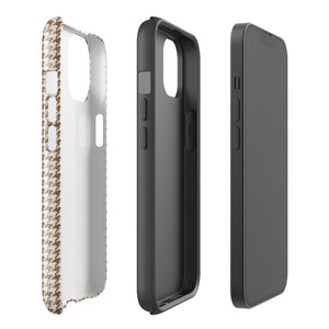 A smartphone with a brown and beige houndstooth-patterned case is shown from the back. The impact-resistant, dual-layered Classic Houndstooth for iPhone by Statement Cases protects the phone's body and leaves openings for the camera lenses and flash. The hues give the case a stylish and sophisticated appearance.