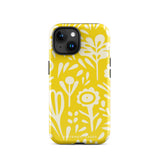 The Sol Dorado for iPhone by Statement Cases is a smartphone with a yellow case featuring a white, abstract floral and plant pattern. The camera lenses are prominent in the top left corner of the device. With dual-layer protection and impact-resistant TPU lining, "Statement Cases" is printed at the bottom of the case.