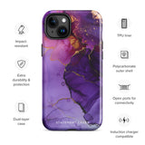 A Statement Cases Golden Orchid Marble for iPhone with a case featuring an abstract design of swirling purple, pink, and gold hues over a white background. The marbled patterns with metallic accents provide dual-layer protection and are impact-resistant. The top of the case has cutouts for the phone's camera lenses and is induction charging compatible.